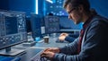 Software Developer Programming, Finding Solutions while Working on Desktop Computers in Data Cente Royalty Free Stock Photo