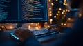 A software developer works on a laptop late at night, writing JavaScript code, symbolizing mobile app development Royalty Free Stock Photo