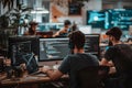 Software Developers Collaborate on Complex Coding Projects, Utilizing Multiple Screens and Advanced Technologies in a Modern Royalty Free Stock Photo