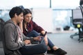 Software developers couple working on the floor Royalty Free Stock Photo