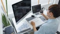 Software development concept, Male programmer checking website programming and drinking coffee