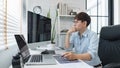 Software development concept, Male programmer read data code to thinking about developing website