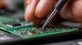 Software Development Precision Hand-Soldering on a Green Circuit Board for Royalty Free Stock Photo