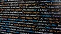 Software development. Programmer coding on the computer monitor. Close-up. Computer program code on a black background. Royalty Free Stock Photo