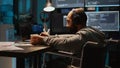 Software engineer using terminal window on laptop to program new code Royalty Free Stock Photo