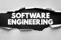 Software Engineering text in grunge bold typography under torn paper design. Conceptual image about technology, coding, Royalty Free Stock Photo