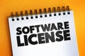 Software License text quote on notepad, concept background