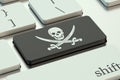 Software piracy concept, on the computer keyboard Royalty Free Stock Photo
