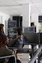 Software programmer with physical disability working on server coding Royalty Free Stock Photo