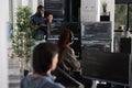 Software programmers discussing about algorithms on big screen Royalty Free Stock Photo