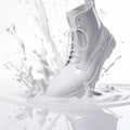 Soggy White Boots Jumping Into A Splash Of Milk