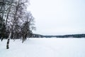 Sognsvann lake in Oslo, Norway, frozen a covered with snow