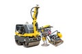 Soil compaction equipment for construction work. Roller, hand rammer, and vibratory plate. Construction equipment rental Royalty Free Stock Photo