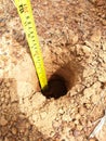 Soil depth measurement by soil auger and meter