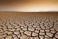 Soil drought. cracked earth. landscape in the sunset sky Royalty Free Stock Photo