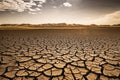 Soil drought. cracked earth. landscape in the sunset sky Royalty Free Stock Photo