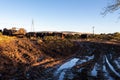 Soil erosion as a result of heavy cattle grazing at a feedlot in a field Royalty Free Stock Photo