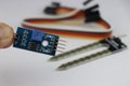 Soil moisture sensor module for converting analog to digital signal held in hand