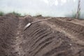 Soil Ridging by shovel in greenhouse Royalty Free Stock Photo