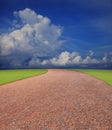 Soil road line to the horizontal with blue sky whi