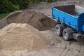 Construction site. Soil and sand brought in by trucks