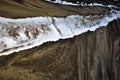 Soil with snow close up detail, natural background texture Royalty Free Stock Photo