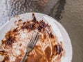 Soiled cake plate and a fork Royalty Free Stock Photo