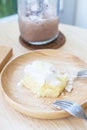 Soiled cake plate on wood Royalty Free Stock Photo