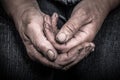 Soiled hands of elderly women