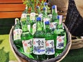 Soju display on basket shelf in store, Korean alcoholic drinks, Korean liquor in an Asian supermarket Royalty Free Stock Photo