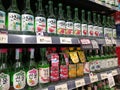 Sojub fruit liqueur, packaged in green glass bottles, is available on shelves in supermarkets.