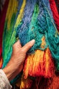 Birghtly colored yarn for sale at a market in Srinagar