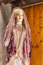 Mannequin in a headscarf and traditional dress at a market in Srinagar