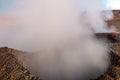 The Sol de la Manana, Rising Sun steaming geyser field high up in a massive crater in Bolivian Altiplano, Bolivia Royalty Free Stock Photo