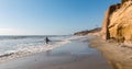 Lone Male Surfer Enters Ocean at Solana Beach