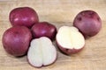 Solanum tuberosum on rustic background