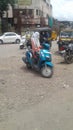 Blue scooter with Indian charming girl, Solapur