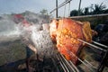 Solar-Barbecued pork from a glass.