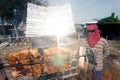 Solar-Barbecued pork from a glass.