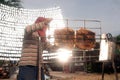 Solar-Barbecued pork from a glass.