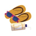 solar blocker bottle with sandals and sunglasses