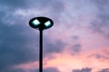 solar cell lamp and orange sky background sunset time.Renewable energy to reduce global warming Royalty Free Stock Photo