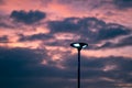 solar cell lamp and orange sky background sunset time.Renewable energy to reduce global warming Royalty Free Stock Photo