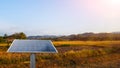 Solar cell panel installed at the paddy fields to provide power to the field water pump Royalty Free Stock Photo