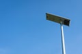 Solar cell panel LED lighting pole on blue sky background Royalty Free Stock Photo