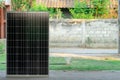 Solar cell in smart home electricity power to control automatic water sprinkler in green grass yard