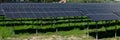 Solar cells farm, solar panels energy station, ecological and renewable electricity panoramic background web banner Royalty Free Stock Photo