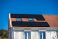 Solar cells mounten in the roof of a house.. Royalty Free Stock Photo