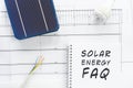 Solar cells, wires and led bulb in conceptual image of solar energy FAQ Royalty Free Stock Photo