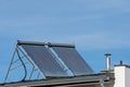 Solar collectors on the roof of a family house Royalty Free Stock Photo